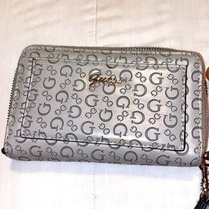 Guess Wallet very nice , gray and black color., good  condition ..